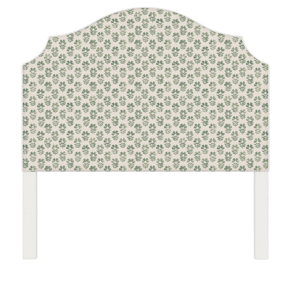 Bella upholstered headboard in Fabric&Frame Natural, shown on a white bed base in a modern bedroom.