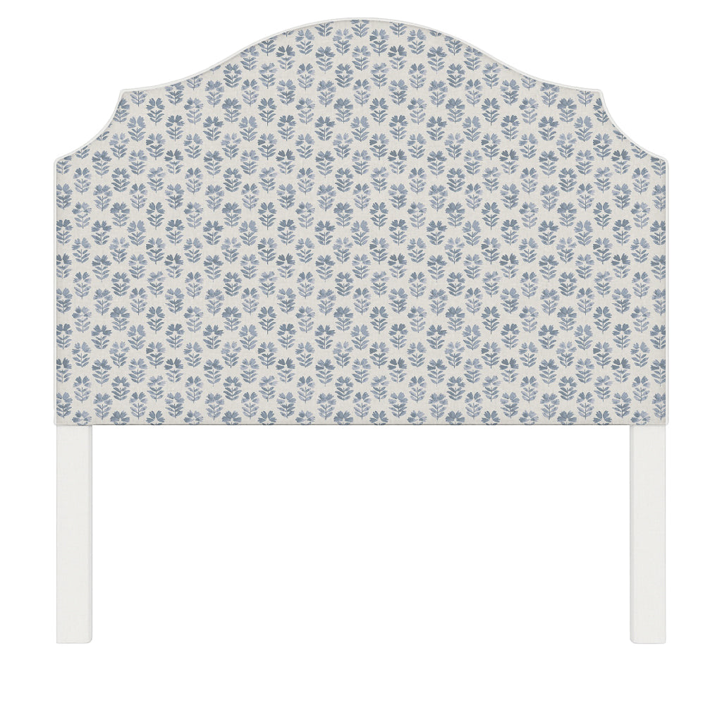 Bella upholstered headboard in Fabric&Frame Natural, shown on a white bed base in a modern bedroom.