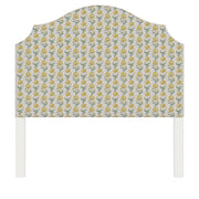 Bella upholstered headboard in Fabric&Frame Ochre, shown on a white bed base in a modern bedroom.