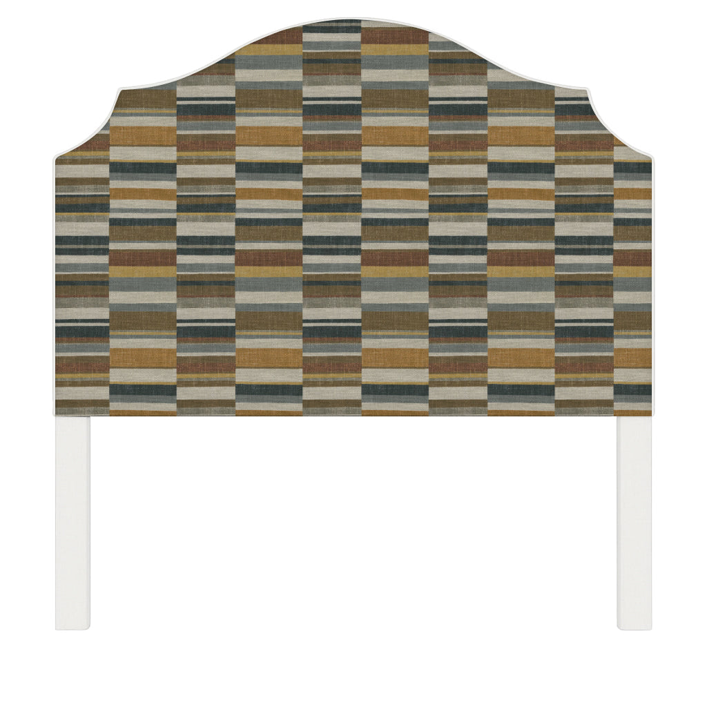 Bella upholstered headboard in Fabric&Frame Rhubarb, shown on a white bed base in a modern bedroom.