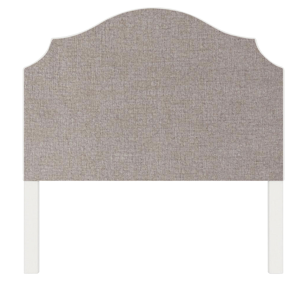 Bella upholstered headboard in Fabric&Frame Santorini, shown on a white bed base in a modern bedroom.