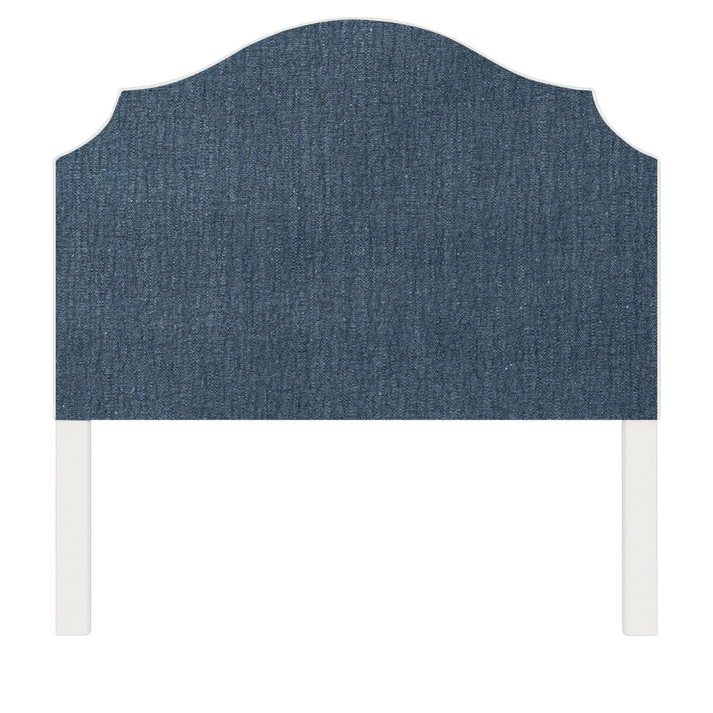 Bella upholstered headboard in Fabric&Frame Santorini, shown on a white bed base in a modern bedroom.