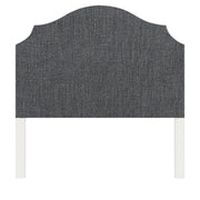 Bella upholstered headboard in Fabric&Frame Santorini, shown on a white bed base in a modern bedroom.