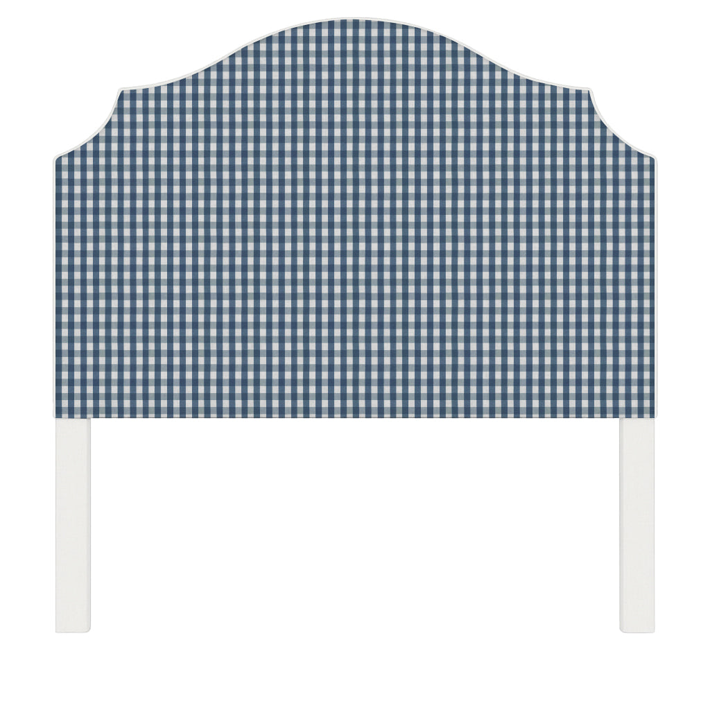 Bella upholstered headboard in Fabric&Frame Indigo, shown on a white bed base in a modern bedroom.