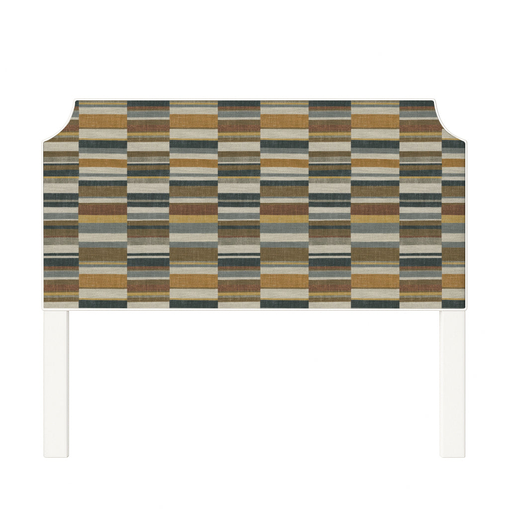 Charlotte upholstered headboard in Fabric&Frame Rhubarb, shown on a white bed base in a modern bedroom.