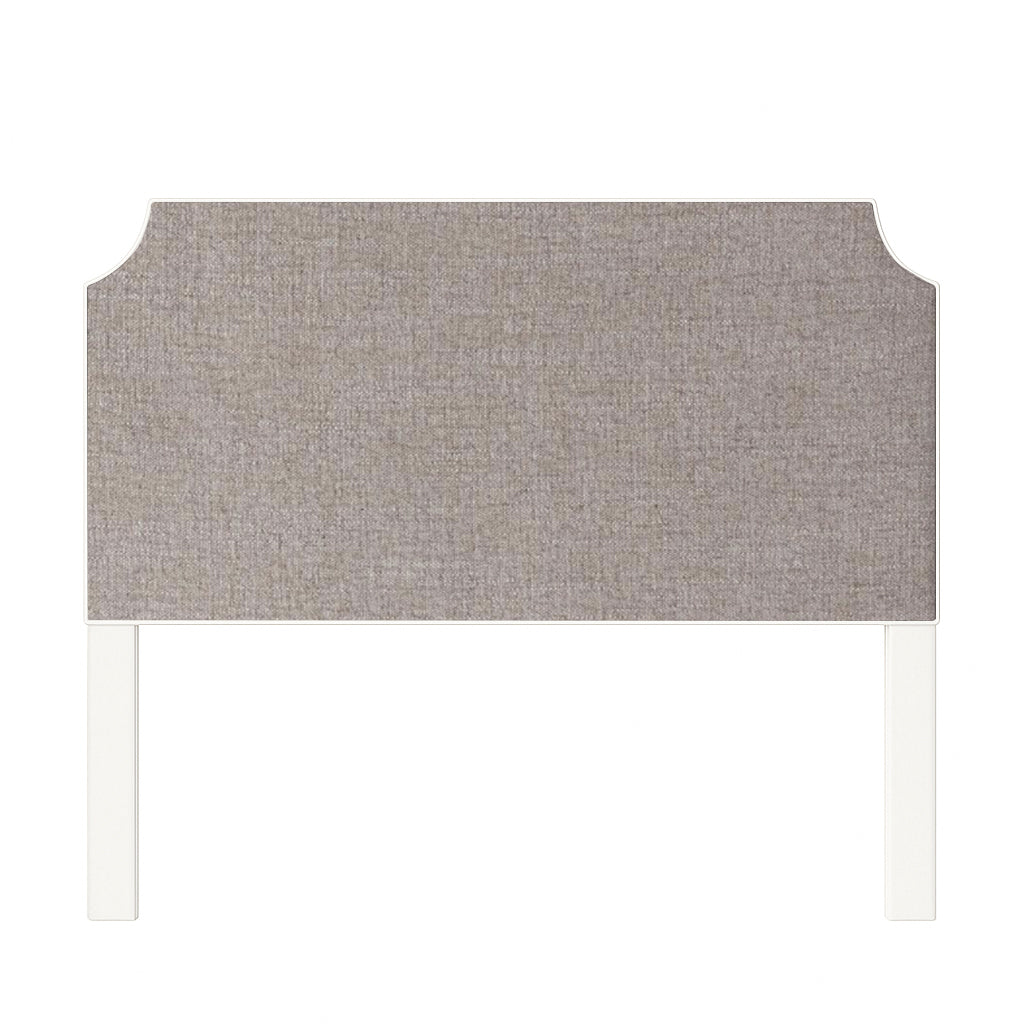 Charlotte upholstered headboard in Fabric&Frame Santorini, shown on a white bed base in a modern bedroom.