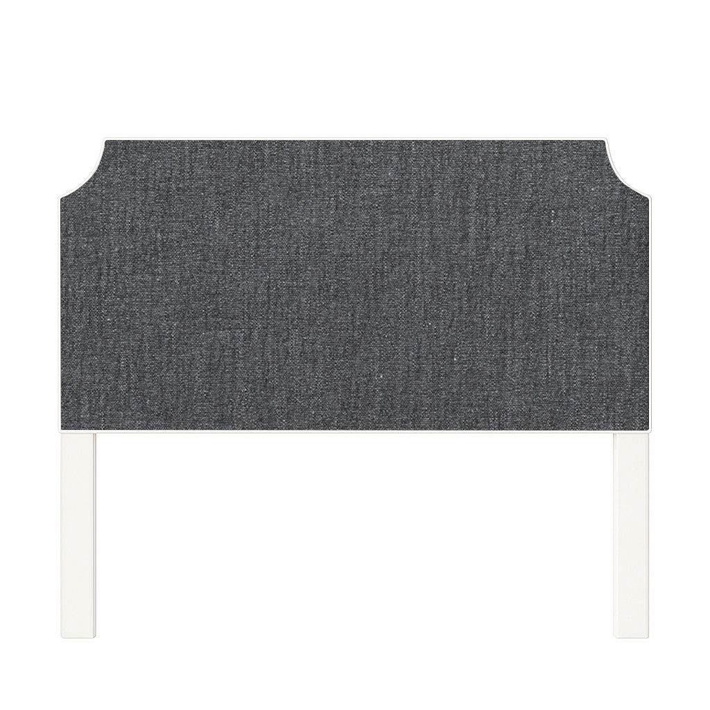 Charlotte upholstered headboard in Fabric&Frame Santorini, shown on a white bed base in a modern bedroom.