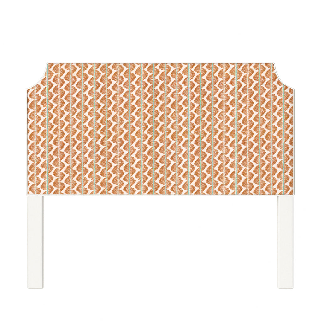 Charlotte upholstered headboard in Fabric&Frame Buxton Blue, shown on a white bed base in a modern bedroom.