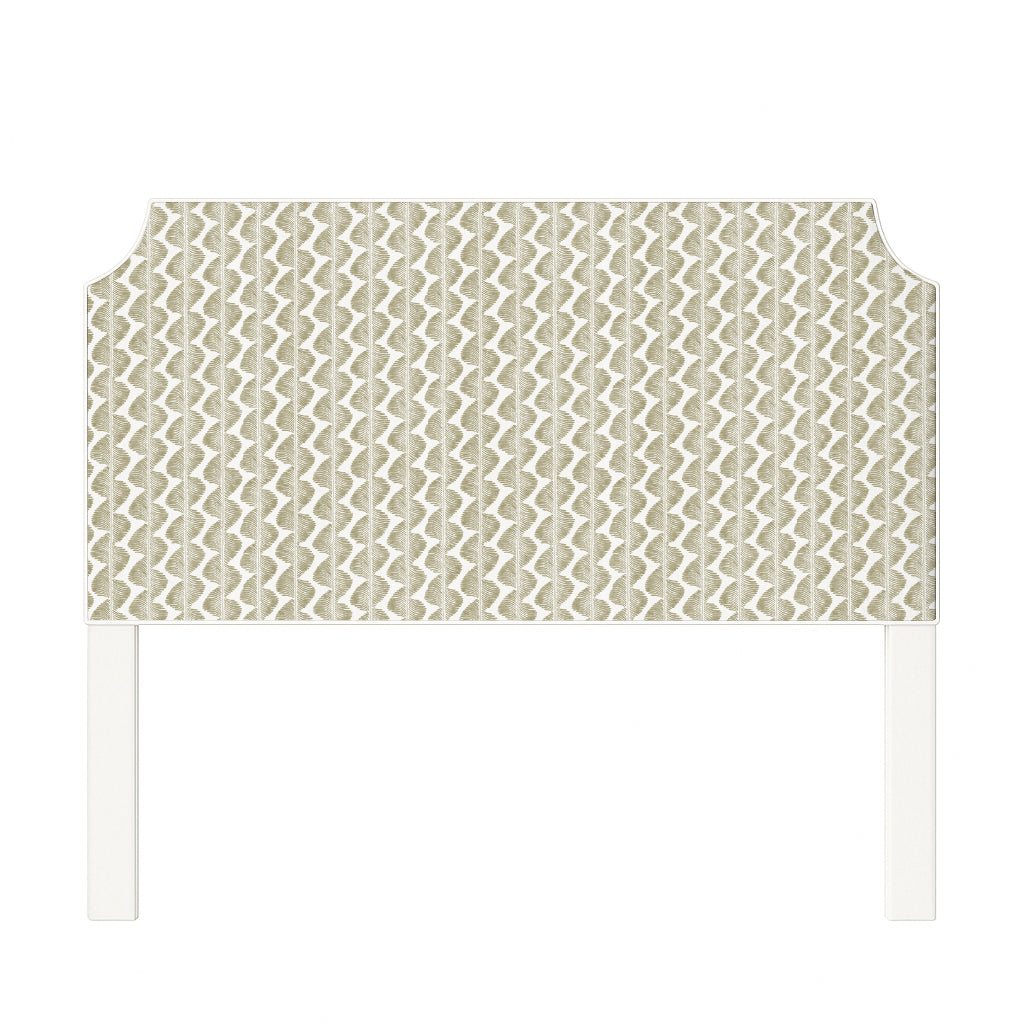 Charlotte upholstered headboard in Fabric&Frame Buxton Blue, shown on a white bed base in a modern bedroom.