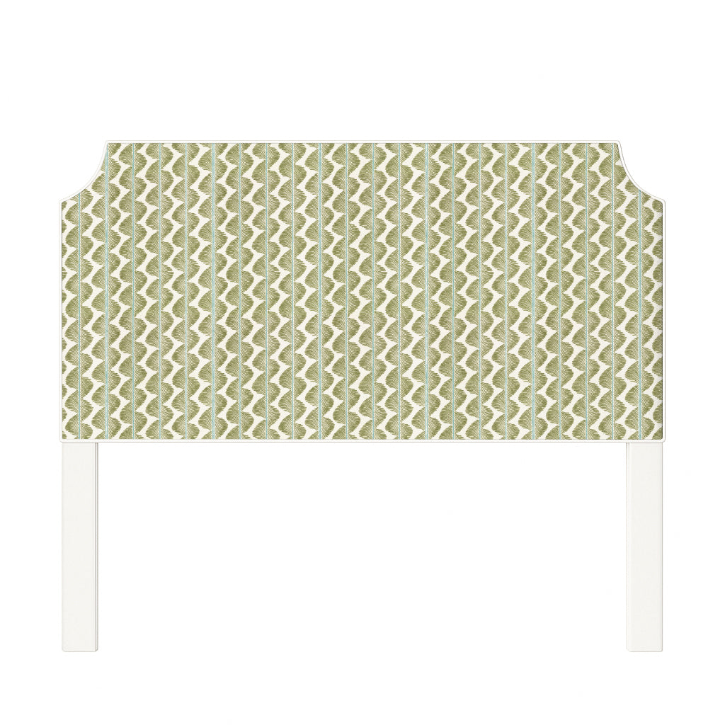 Charlotte upholstered headboard in Fabric&Frame Buxton Blue, shown on a white bed base in a modern bedroom.