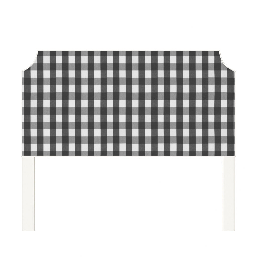 Charlotte upholstered headboard in Fabric&Frame Indigo, shown on a white bed base in a modern bedroom.