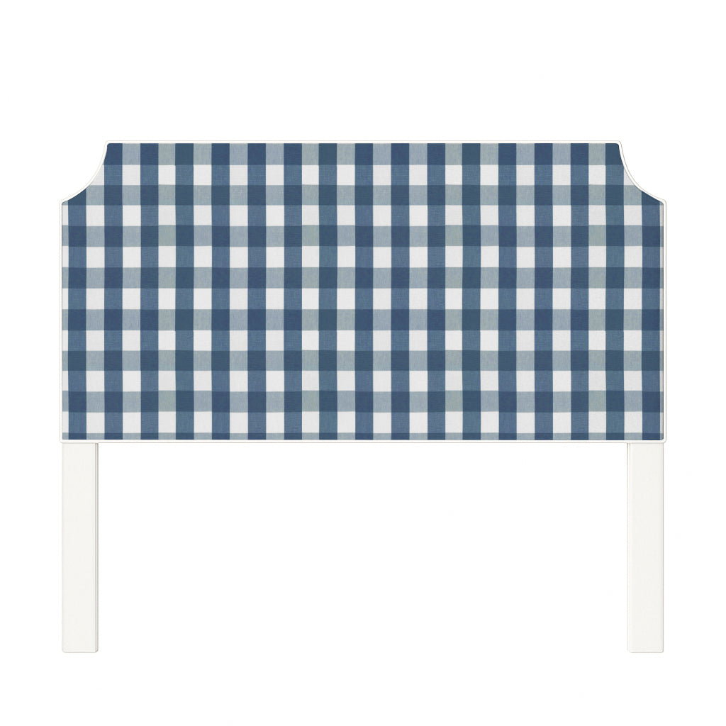 Charlotte upholstered headboard in Fabric&Frame Indigo, shown on a white bed base in a modern bedroom.