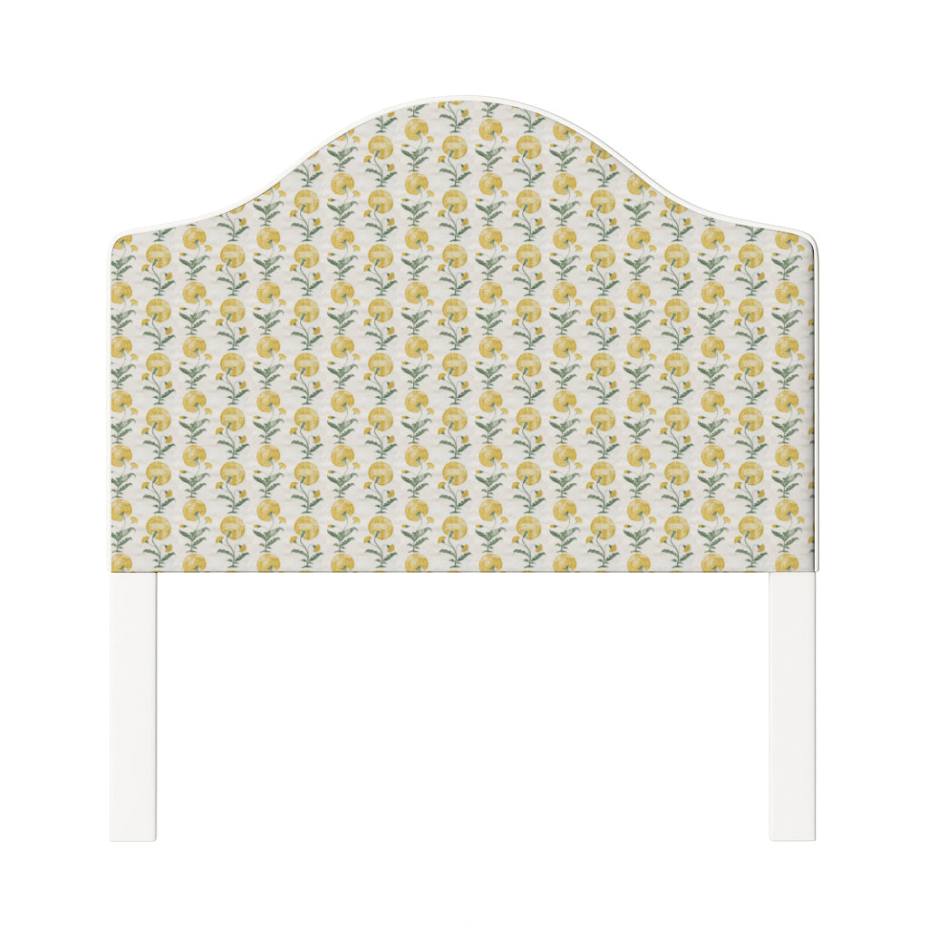 Daisy upholstered headboard in Fabric&Frame Ochre, shown on a white bed base in a modern bedroom.