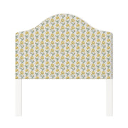 Daisy upholstered headboard in Fabric&Frame Ochre, shown on a white bed base in a modern bedroom.