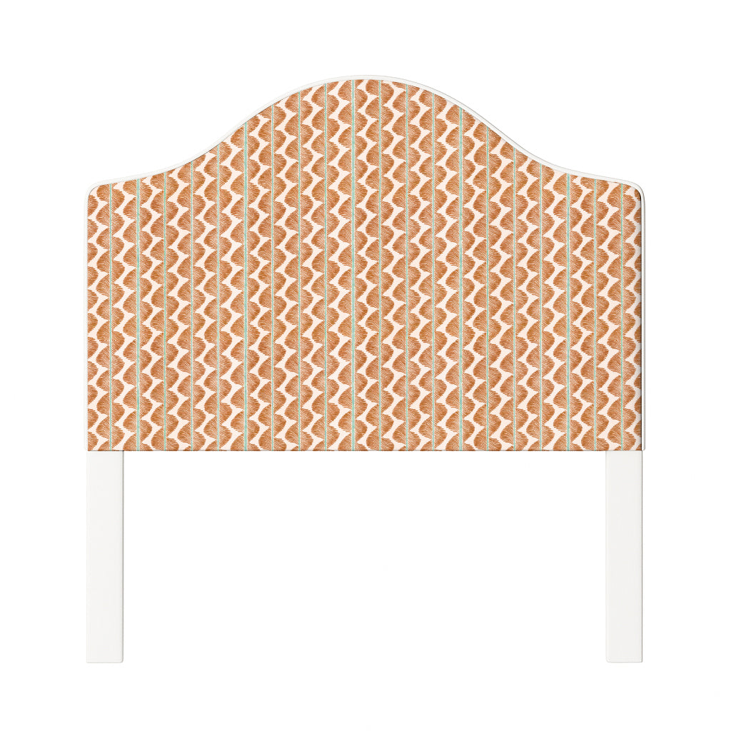 Daisy upholstered headboard in Fabric&Frame Buxton Blue, shown on a white bed base in a modern bedroom.
