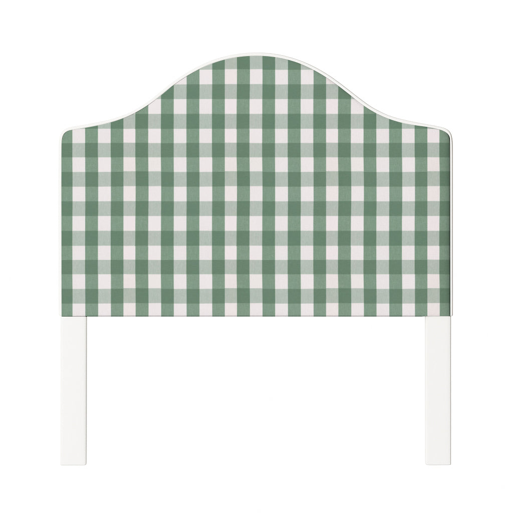 Daisy upholstered headboard in Fabric&Frame Indigo, shown on a white bed base in a modern bedroom.