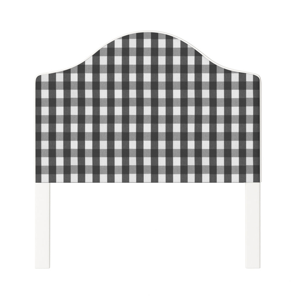 Daisy upholstered headboard in Fabric&Frame Indigo, shown on a white bed base in a modern bedroom.