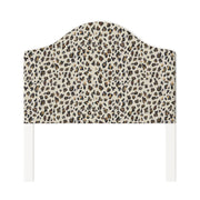 Daisy upholstered headboard in Fabric&Frame Spinach on Pink, shown on a white bed base in a modern bedroom.