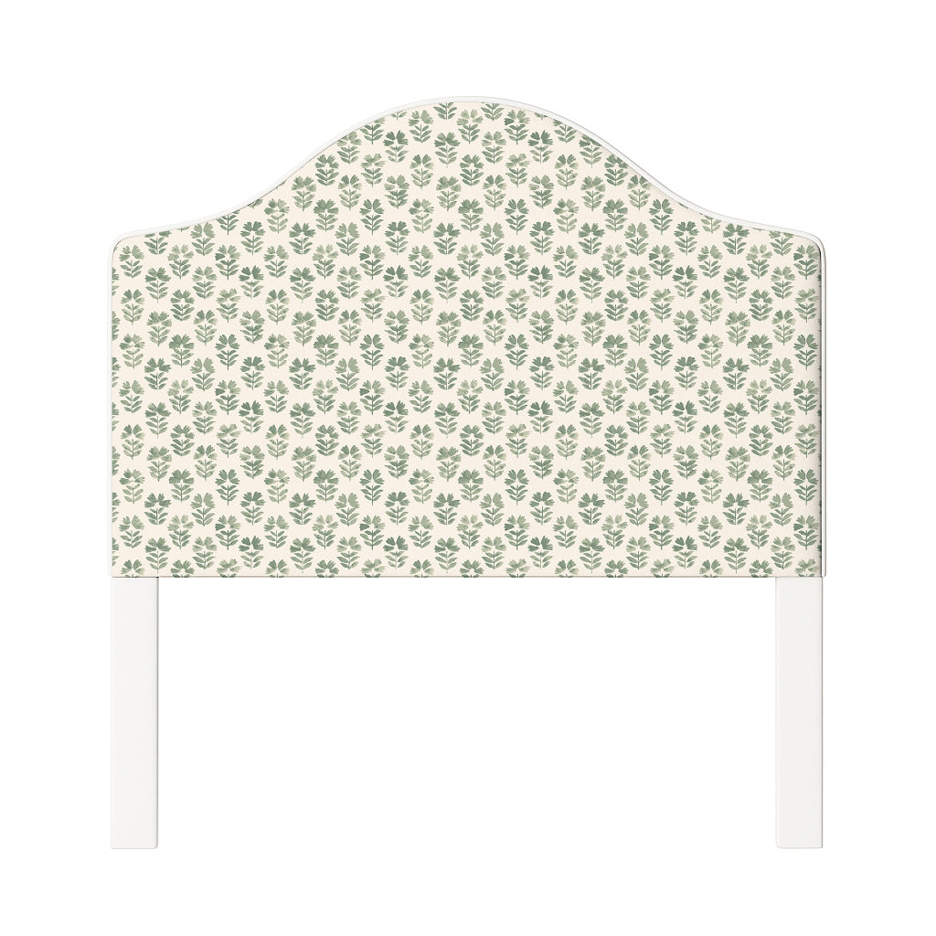 Daisy upholstered headboard in Fabric&Frame Natural, shown on a white bed base in a modern bedroom.