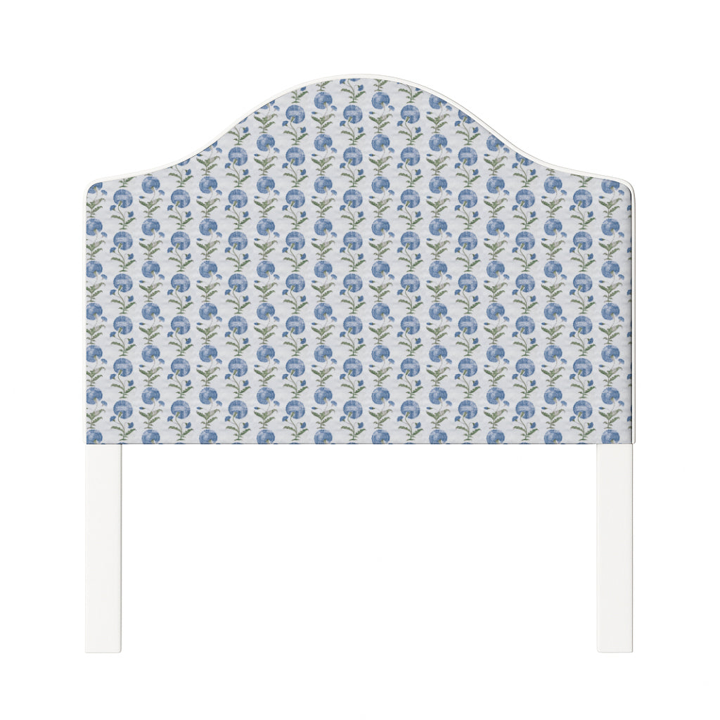 Daisy upholstered headboard in Fabric&Frame Ochre, shown on a white bed base in a modern bedroom.