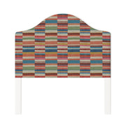 Daisy upholstered headboard in Fabric&Frame Rhubarb, shown on a white bed base in a modern bedroom.