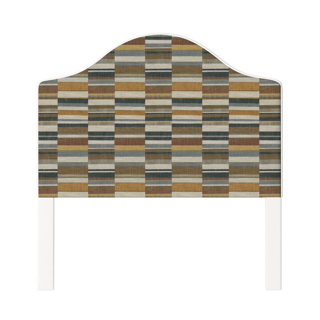 Daisy upholstered headboard in Fabric&Frame Rhubarb, shown on a white bed base in a modern bedroom.