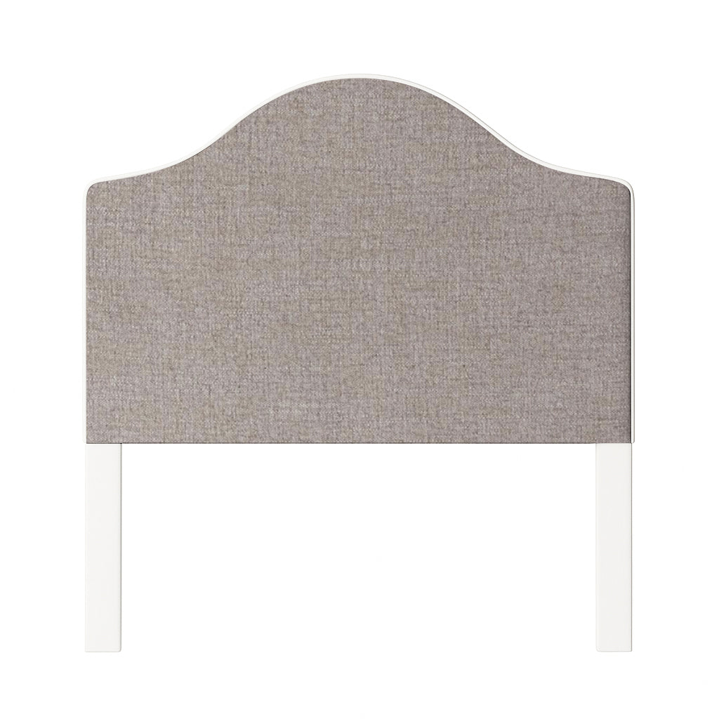 Daisy upholstered headboard in Fabric&Frame Santorini, shown on a white bed base in a modern bedroom.