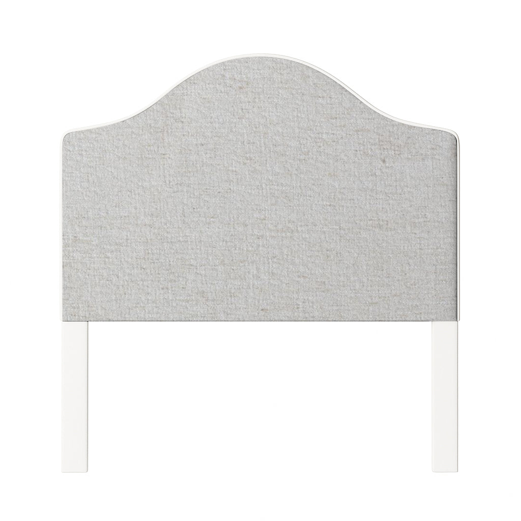 Daisy upholstered headboard in Fabric&Frame Santorini, shown on a white bed base in a modern bedroom.