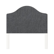 Daisy upholstered headboard in Fabric&Frame Santorini, shown on a white bed base in a modern bedroom.