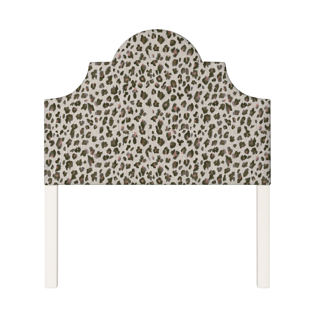 Florence upholstered headboard in Fabric&Frame Spinach on Pink, shown on a white bed base in a modern bedroom.