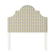 Florence upholstered headboard in Fabric&Frame Ochre, shown on a white bed base in a modern bedroom.