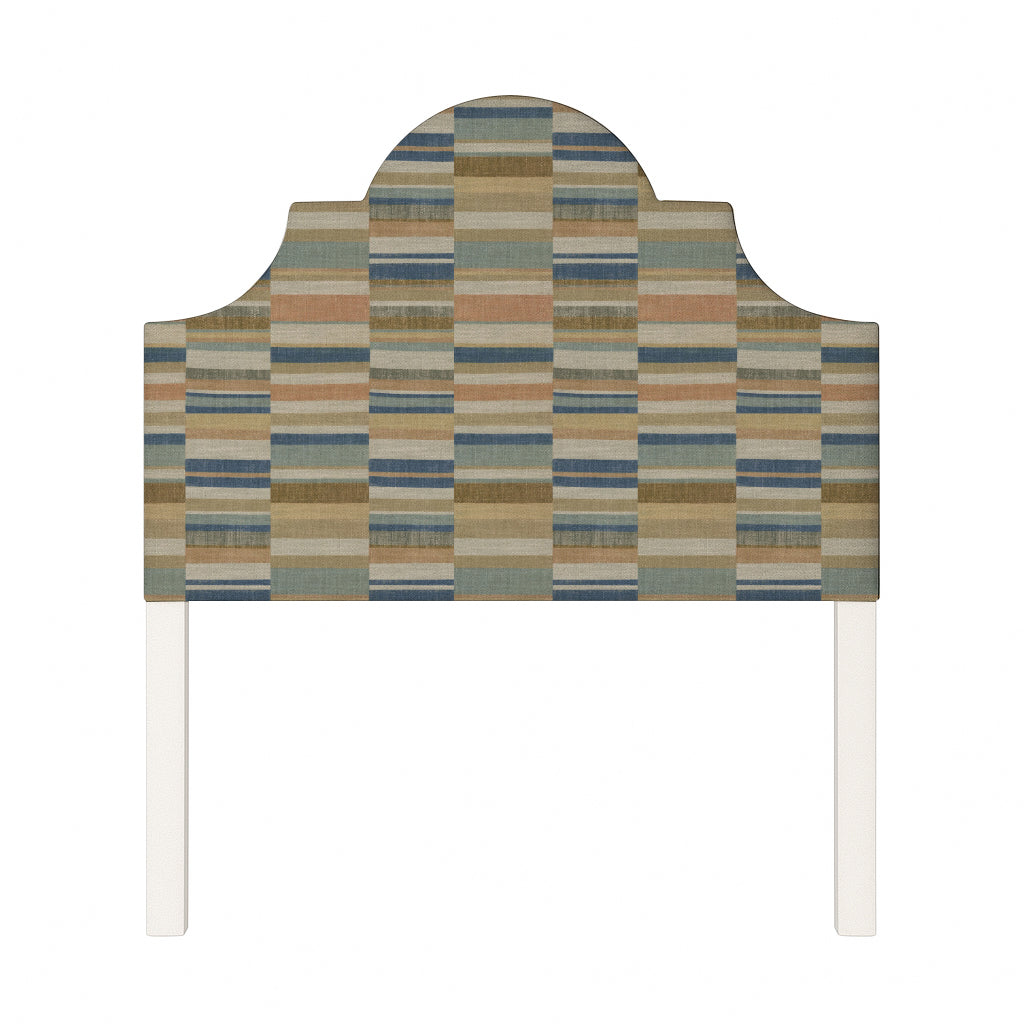 Florence upholstered headboard in Fabric&Frame Rhubarb, shown on a white bed base in a modern bedroom.