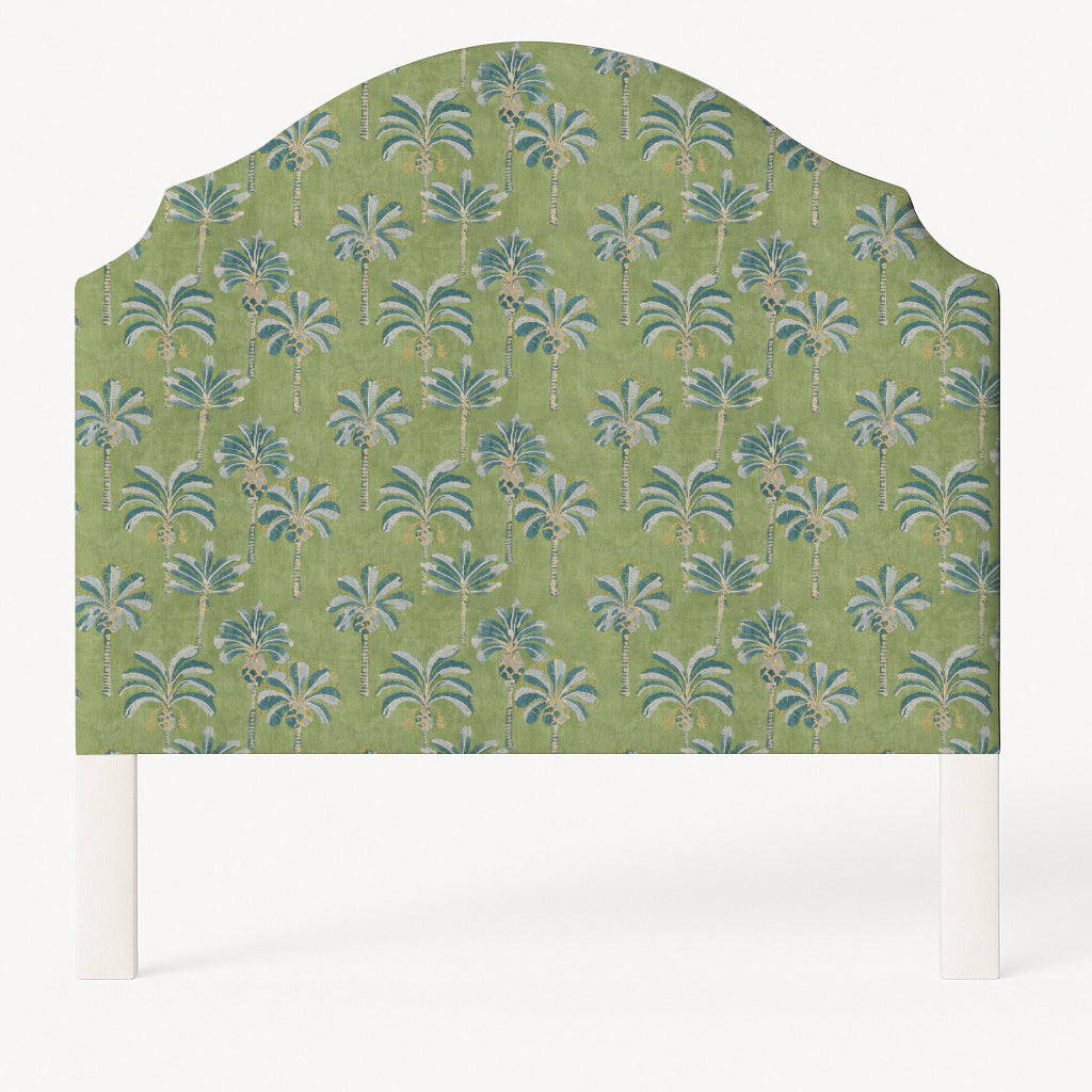 Grace upholstered headboard in Fabric&Frame Oasis, shown on a white bed base in a modern bedroom.
