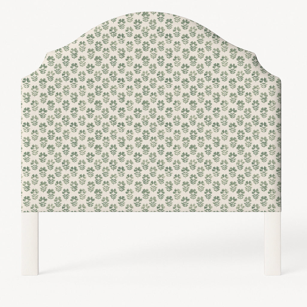 Grace upholstered headboard in Fabric&Frame Natural, shown on a white bed base in a modern bedroom.