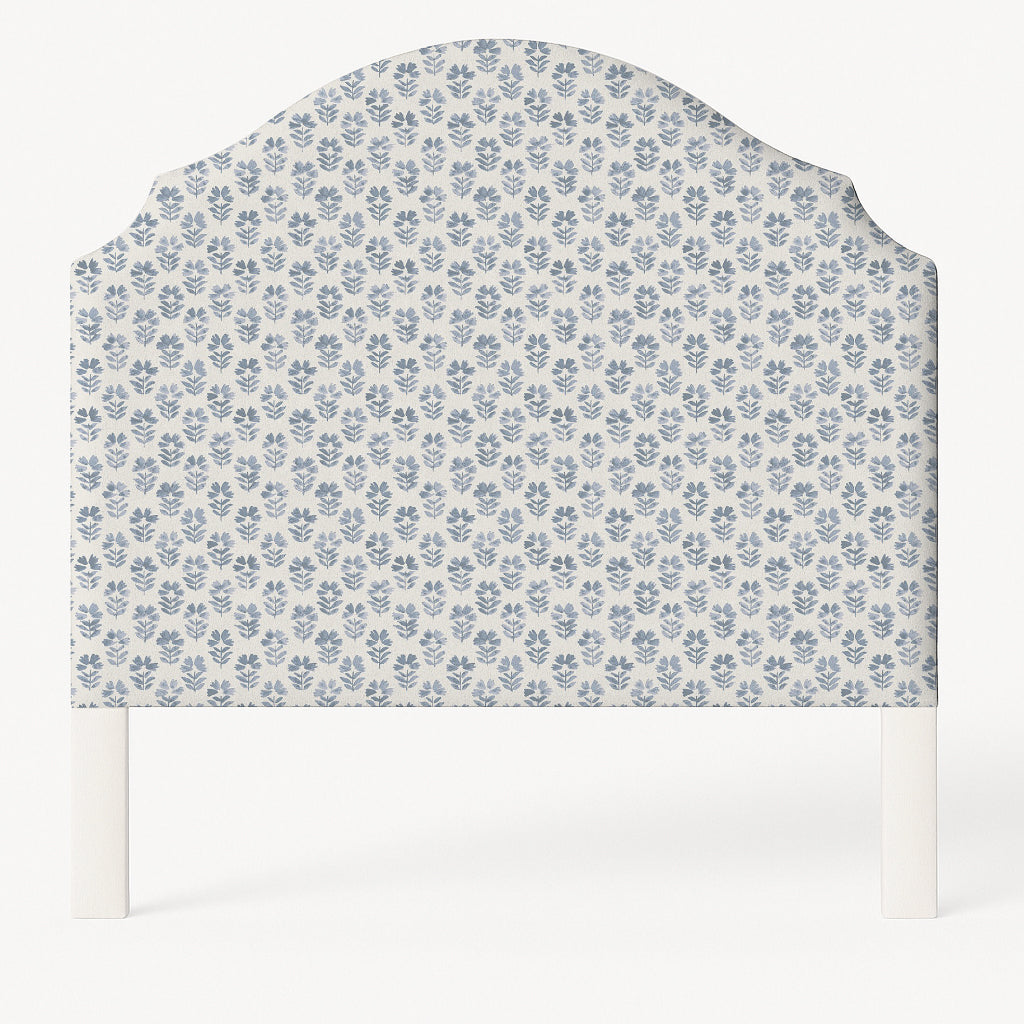 Grace upholstered headboard in Fabric&Frame Natural, shown on a white bed base in a modern bedroom.