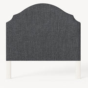 Grace upholstered headboard in Fabric&Frame Santorini, shown on a white bed base in a modern bedroom.