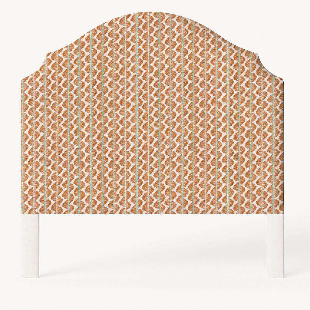 Grace upholstered headboard in Fabric&Frame Buxton Blue, shown on a white bed base in a modern bedroom.