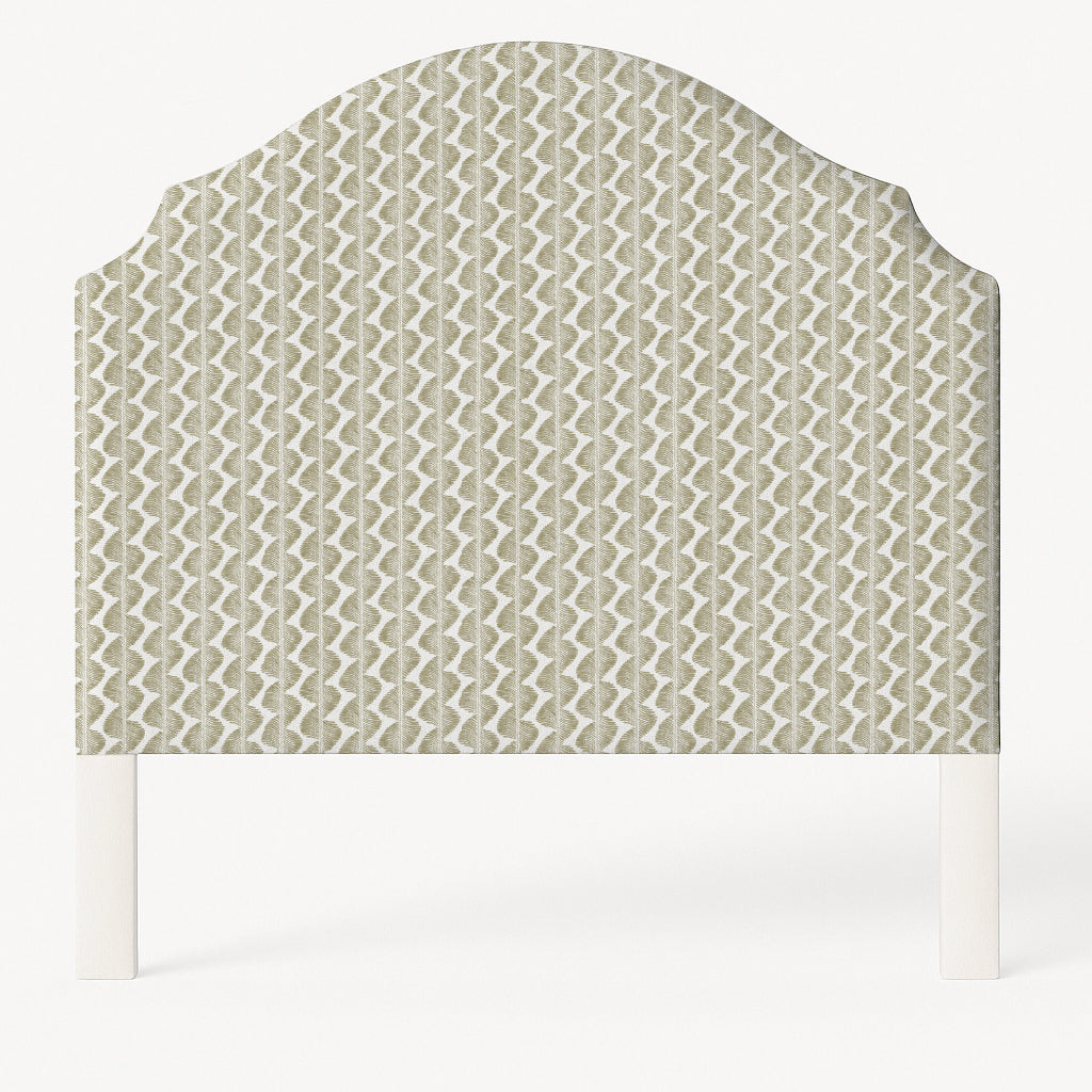 Grace upholstered headboard in Fabric&Frame Buxton Blue, shown on a white bed base in a modern bedroom.