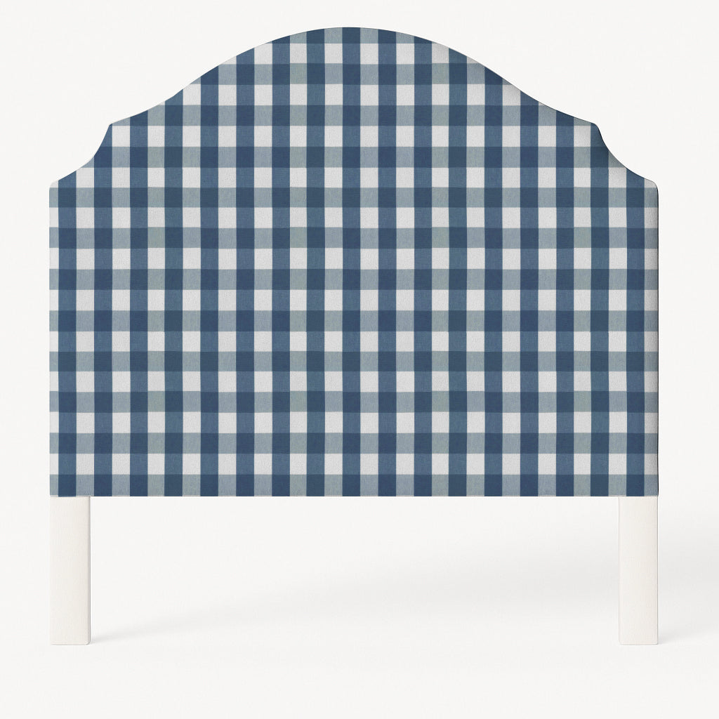 Grace upholstered headboard in Fabric&Frame Indigo, shown on a white bed base in a modern bedroom.