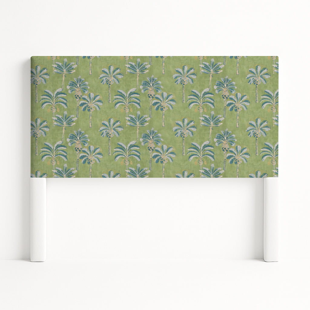 Iris upholstered headboard in Fabric&Frame Oasis, shown on a white bed base in a modern bedroom.