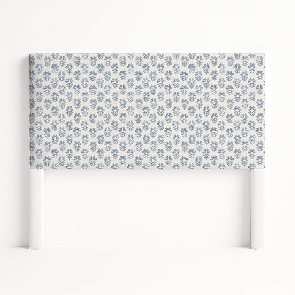 Iris upholstered headboard in Fabric&Frame Natural, shown on a white bed base in a modern bedroom.
