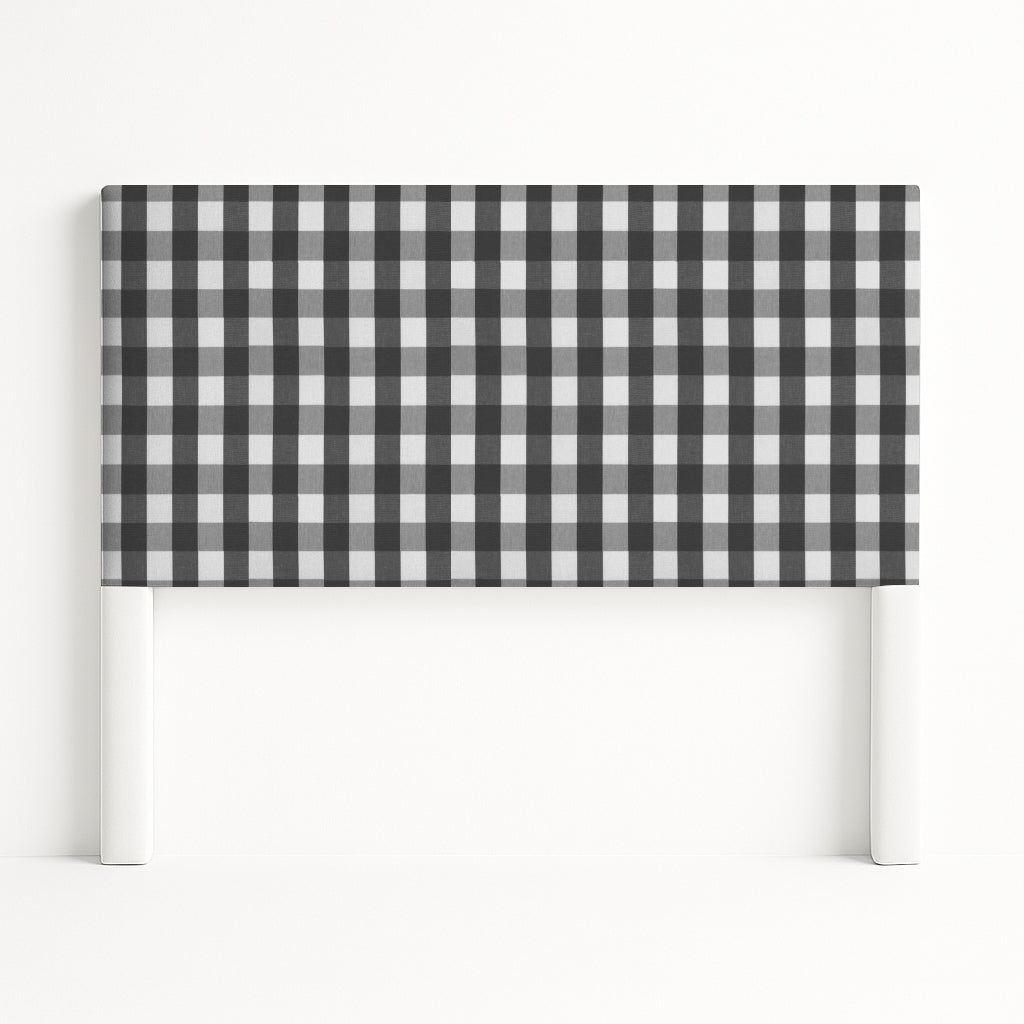 Iris upholstered headboard in Fabric&Frame Indigo, shown on a white bed base in a modern bedroom.